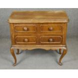 A French Provincial style walnut chest on cabriole suppports. H.60 W.65 D.32cm