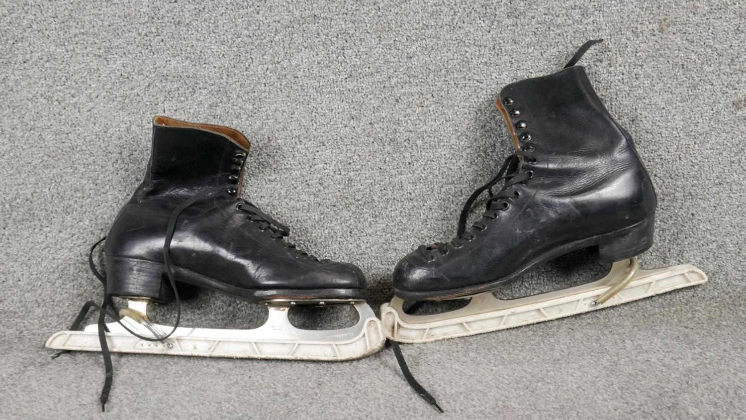 Three pairs of C.1900 black leather ice skates. One with a fold over design and tan leather - Image 4 of 4