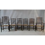 A matched set of six 19th century elm Lancashire ladderback dining chairs on turned stretchered