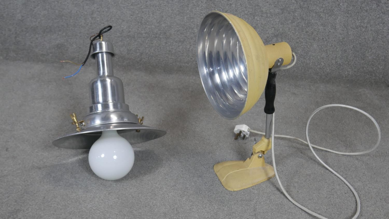A vintage Pifco infra red heat lamp and a vintage style industrial type pendant lamp. H50cm