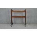 A C.1900 stained beech towel rail on swept supports. H80 W67cm