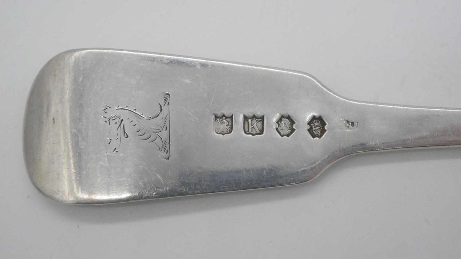 Four Georgian Irish silver filddle pattern serving forks with engraved coat of arms. Hakkmarked: - Image 3 of 4