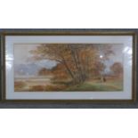 A framed and glazed watercolour landscape of autumn trees. Signed J. Johnson. H50 W93