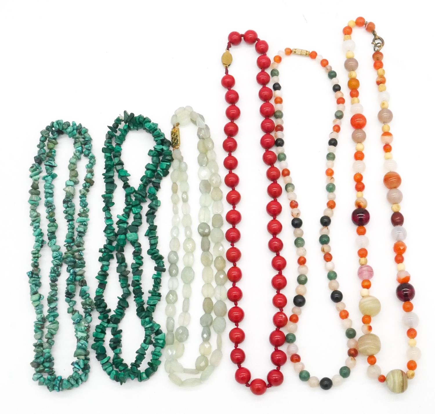 A collection of six gemstone and lacquer necklaces. Including a double stranded faceted green