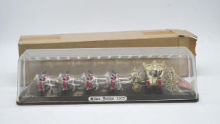 A boxed and cased vintage die-cast model of the Royal State Coach. L.40cm