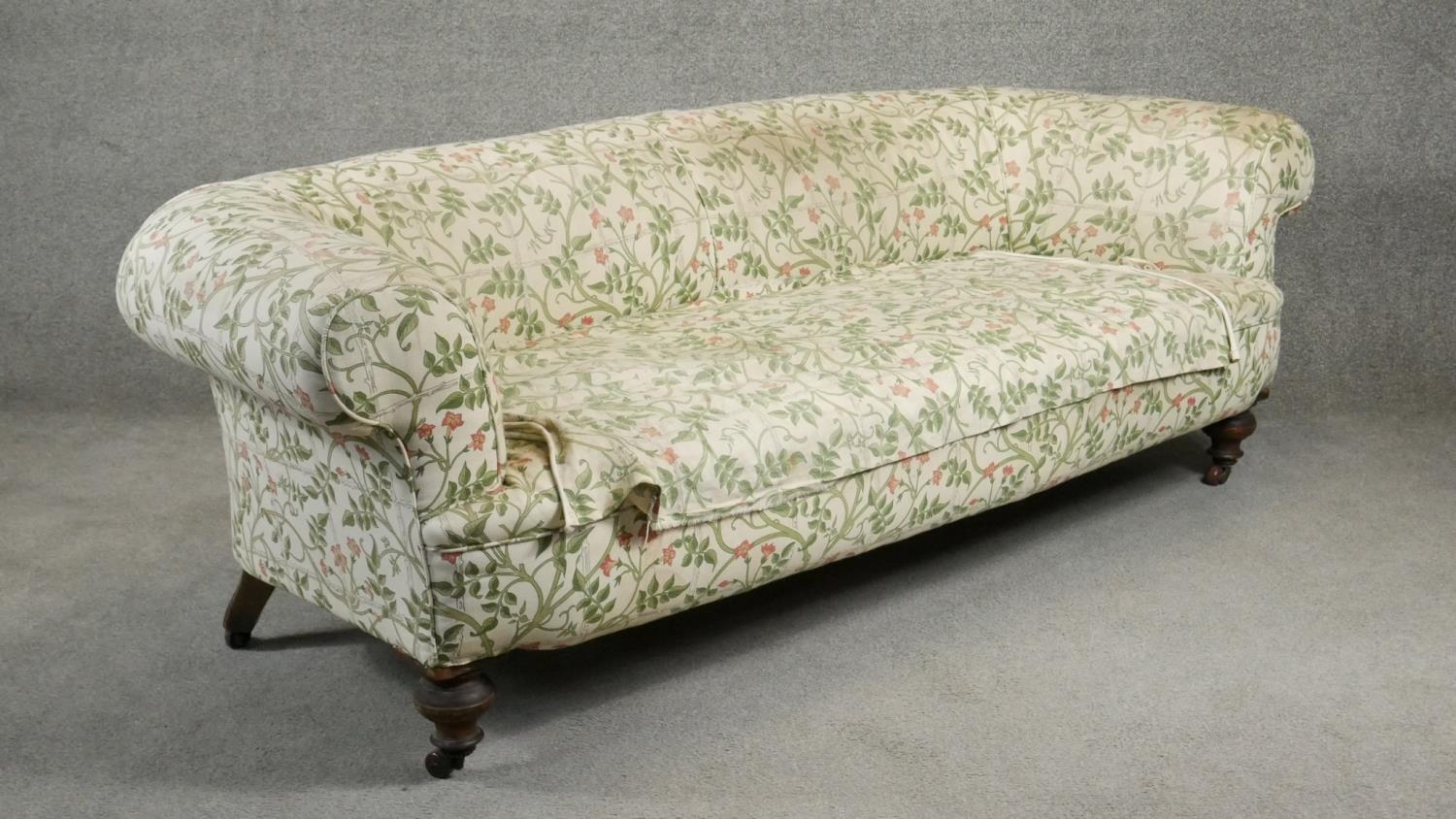 A Victorian Chesterfield sofa on turned walnut feet, in need of re upholstery. H.65 W.190 D.80cm - Image 2 of 3