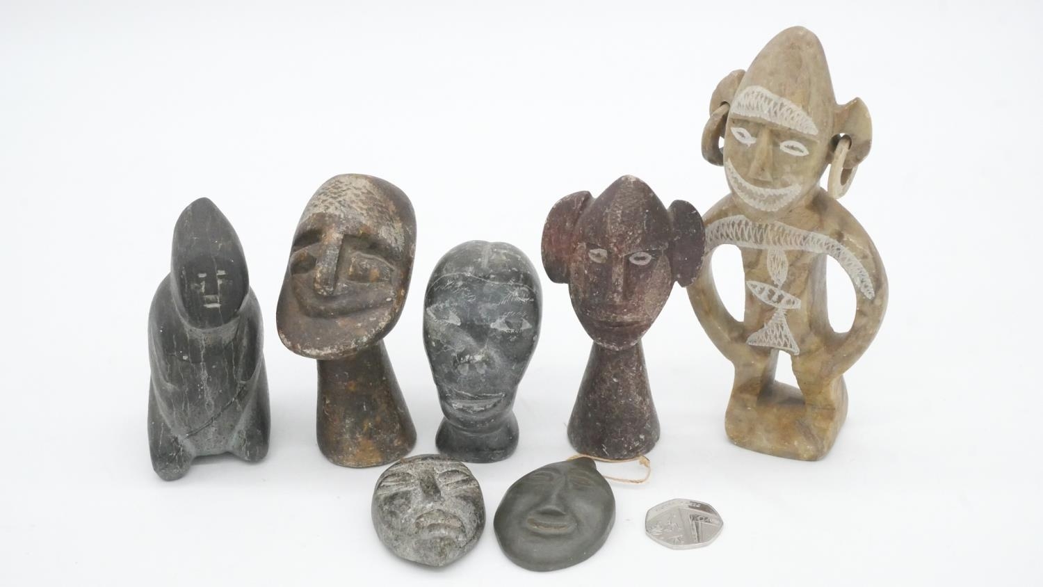 A collection of seven carved hardstone tribal figures, two of faces with hanging loops. H.16cm - Image 7 of 7