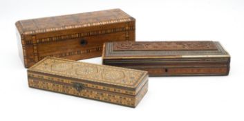 A 19th century walnut Tunbridge inlaid jewellery box and two Damascus style inlaid pen boxes. L.28cm