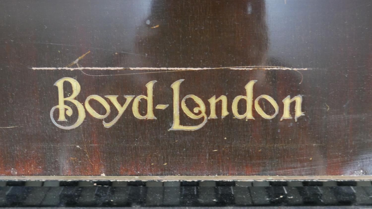 A Boyd of London mahogany cased upright piano with maker's mark to the iron frame. H.131.5 W.148 D. - Image 4 of 4