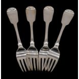 Four Georgian Irish silver filddle pattern serving forks with engraved coat of arms. Hakkmarked: