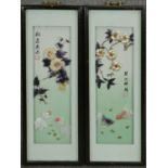 Two framed and glazed Oriental relief works made from different types of sea shells, with