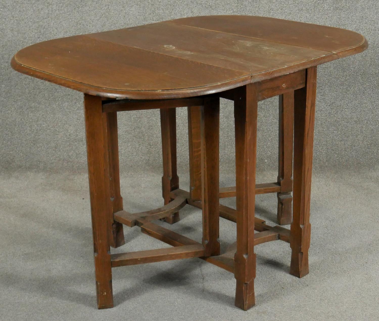 A mid century oak drop leaf table. H.73 W.34 D.76cm - Image 3 of 6