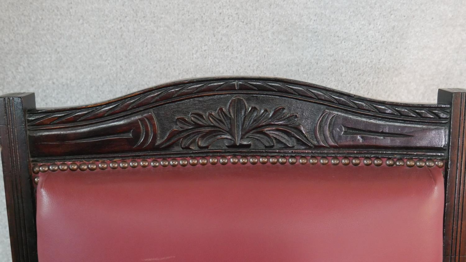 A Victorian carved frame armchair in faux leather upholstery on turned tapering supports. H.98cm - Image 5 of 6