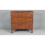 A small Regency mahogany chest of two short above two long drawers on bracket feet. H90 W87 D47cm