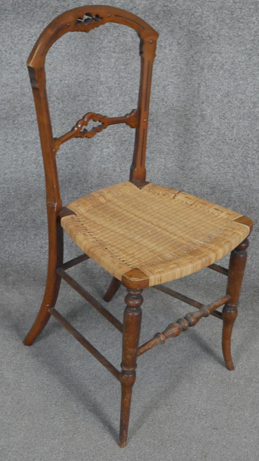 A 19th century walnut bedroom chair with woven seat and a similar caned seat beech chair. - Image 3 of 3