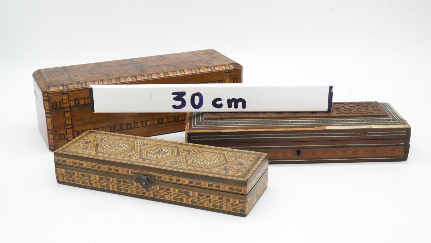 A 19th century walnut Tunbridge inlaid jewellery box and two Damascus style inlaid pen boxes. L.28cm - Image 8 of 8