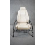 A leather armchair on metal frame, from a Jaguar XJS drivers seat. H.108 W.64 D.90cm