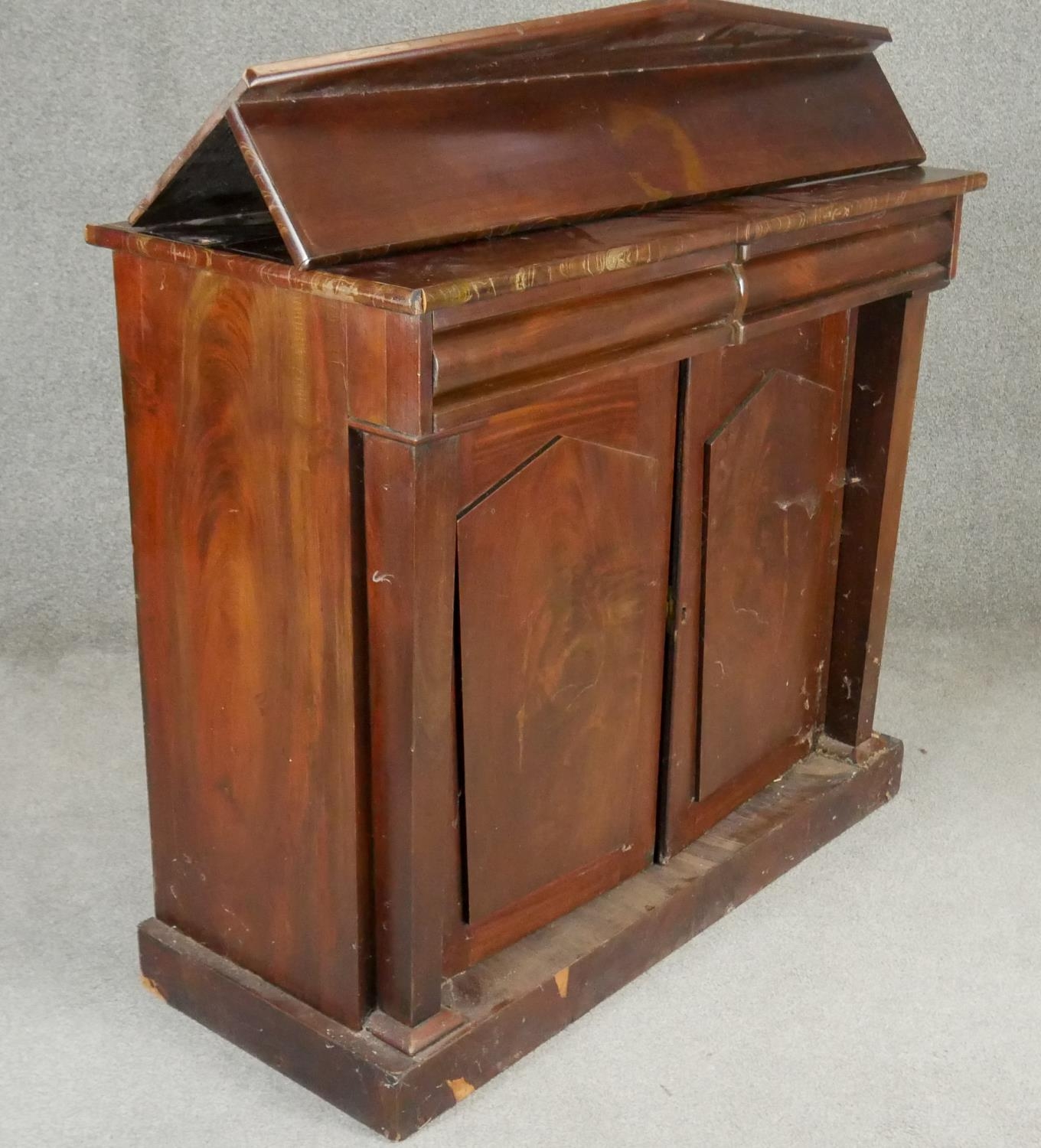 A mid 19th century flame mahogany chiffonier with raised back above frieze drawers and arched - Image 5 of 7