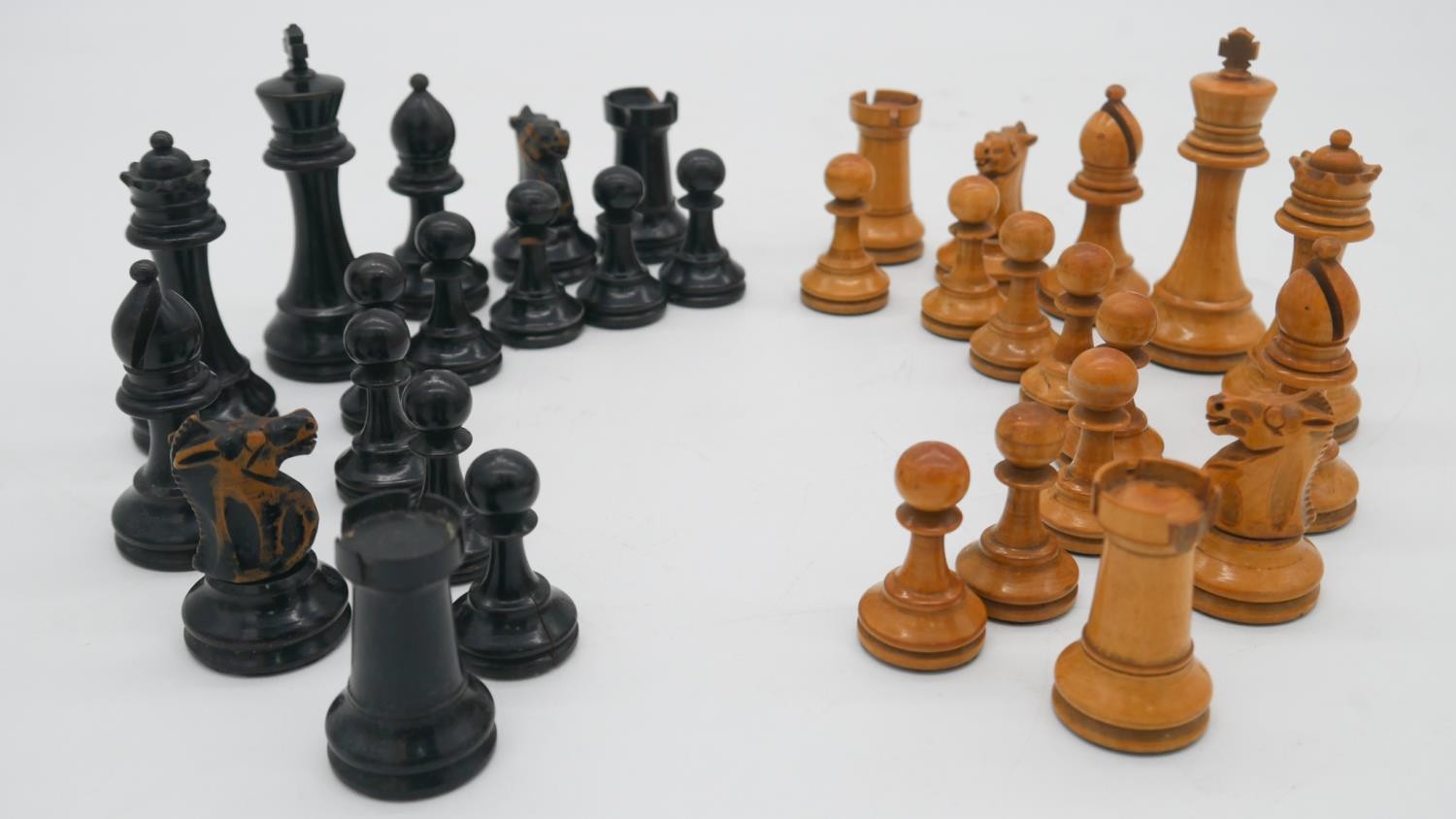 A Staunton style box wood complete chess set, each piece with weighted base.