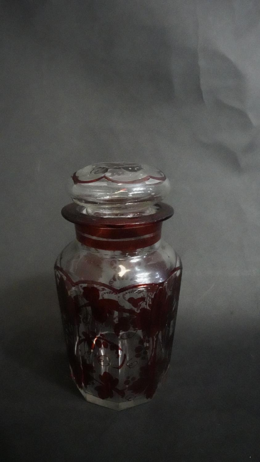 A Bohemian ruby flash glass lidded jar with vine design along with a cut crystal glass lidded - Image 2 of 6
