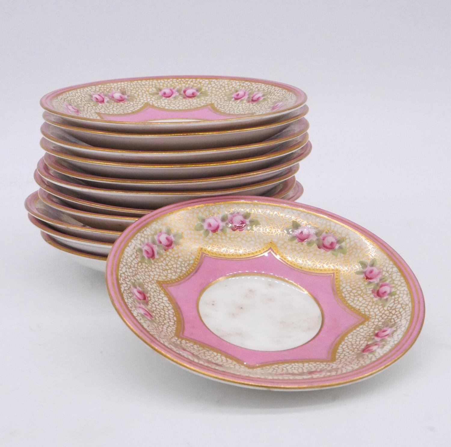 A set of twelve Aynsley 19th century hand painted and gilded porcelain saucers decorated with roses. - Image 4 of 9