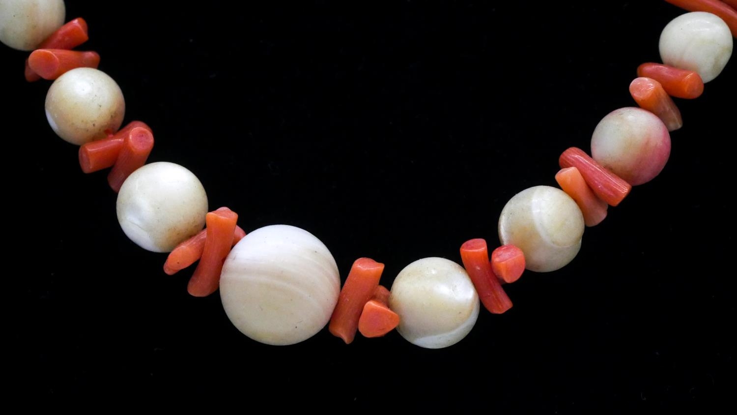Two coral necklaces. One comprising of graduated sections of red branch coral and polished round - Image 3 of 8