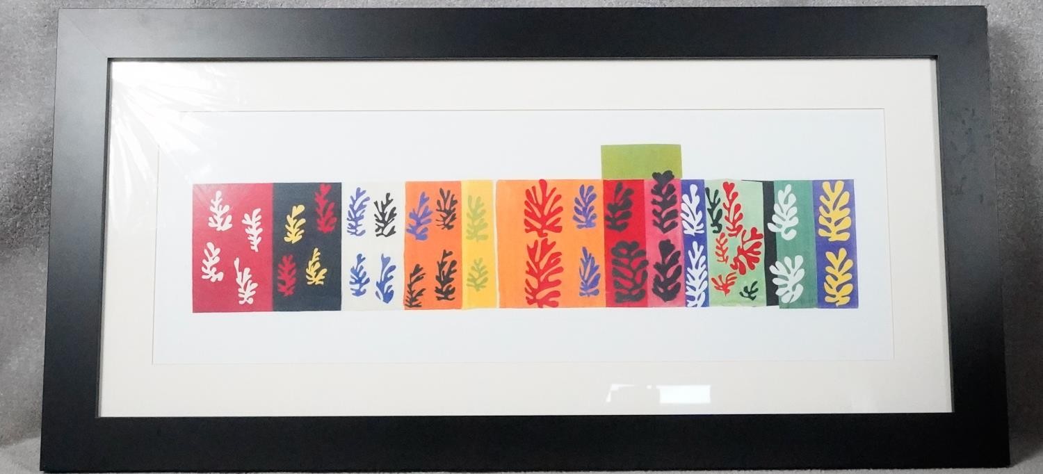 A framed and glazed coloured abstract Matisse print. W126 H62cm.