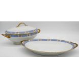 Two pieces of Reynaud Limoges porcelain. A large oval lidded soup tureen and a two handled serving