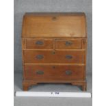 A 19th century country oak bureau with fitted interior. H98 W84 D50
