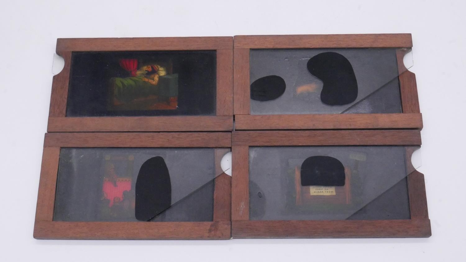 Thirteen mechanical 19th century wooden coloured glass magic lantern slides. Various designs and - Image 3 of 5