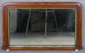 A Victorian walnut Tunbridge inlaid overmantel mirror with original plate in gilt slip resting on
