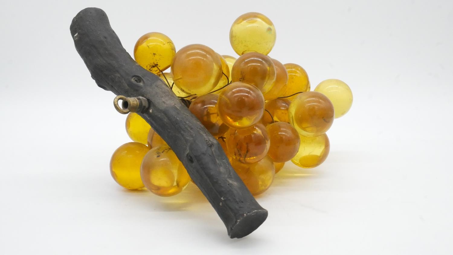 A vintage bunch of amber lucite grapes mounted on a wooden branch. H.18cm - Image 2 of 3