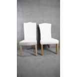 An upholstered high back dining chair and a similar chair. H.115 W.52 D.48 (unfinished back to one