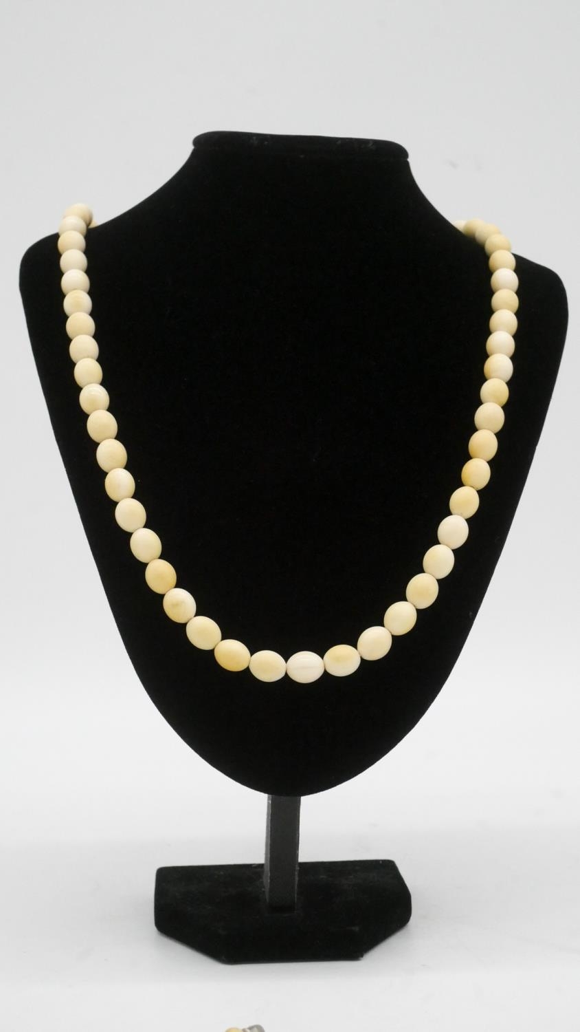 Two Victorian carved graduated ivory bead necklaces along with two Indian pierced bone bead - Image 2 of 10