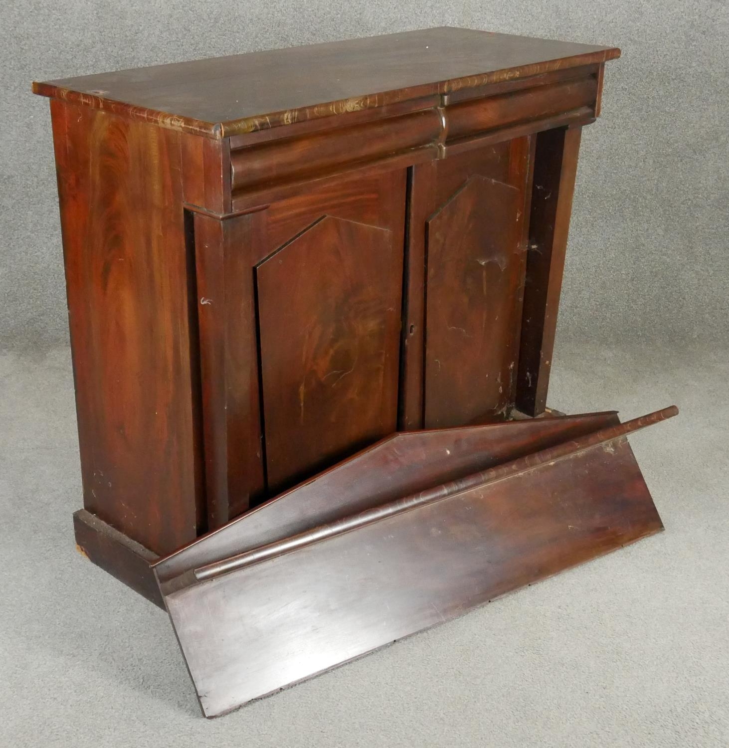 A mid 19th century flame mahogany chiffonier with raised back above frieze drawers and arched - Image 7 of 7