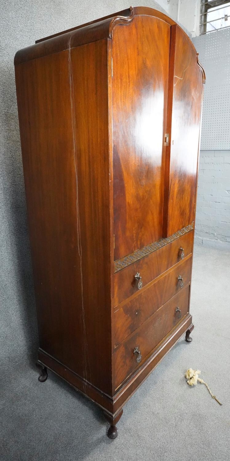 A mid century burr walnut Queen Anne style linen cabinet with panel doors enclosing shelves above - Image 2 of 5