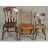 A 19th century elm spindle back hall chair and two 19th century kitchen chairs. H.92cm