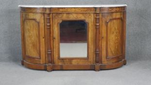 A Victorian burr walnut and satinwood Arabesque inlaid credenza with marble top above cupboards on