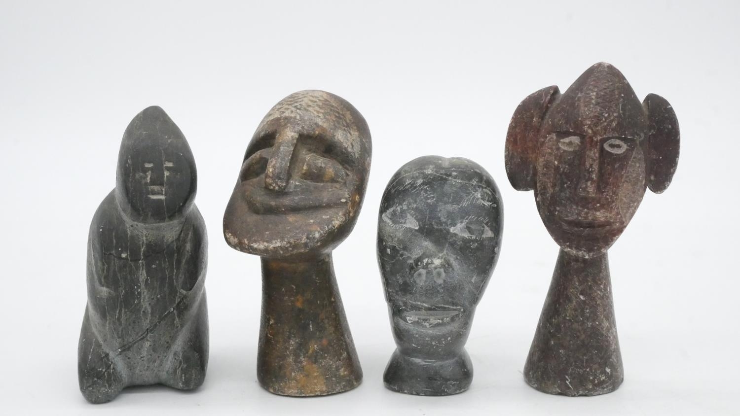 A collection of seven carved hardstone tribal figures, two of faces with hanging loops. H.16cm - Image 2 of 7