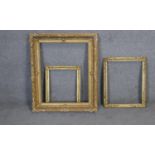 Three 19th century gilt wood and floral gesso decorated picture frames. Largest H86 W71