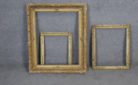 Three 19th century gilt wood and floral gesso decorated picture frames. Largest H86 W71