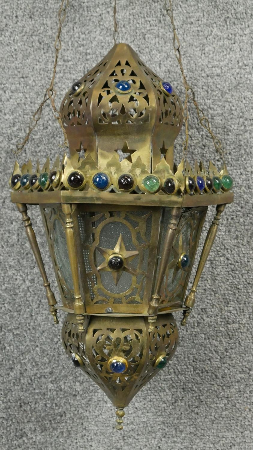 A pierced brass hanging lantern of North African influence. D.25cm - Image 2 of 4