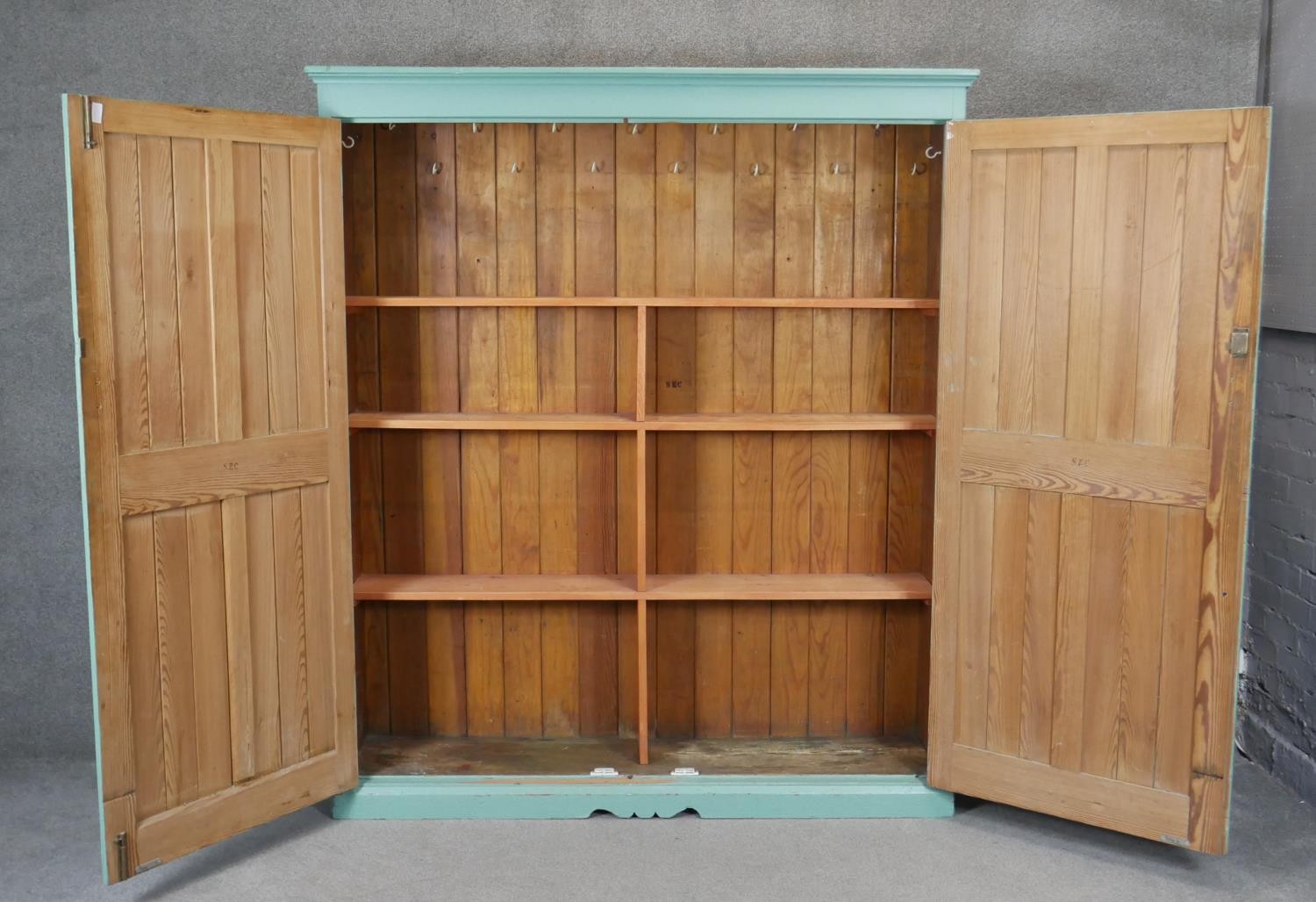 A C.1900 painted pine pantry cupboard with twin panelled doors enclosing a fitted interior. H183 - Image 3 of 4