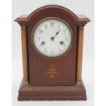 A C.1900 mahogany cased mantel clock with Classical urn and husk swag inlay. H.31cm