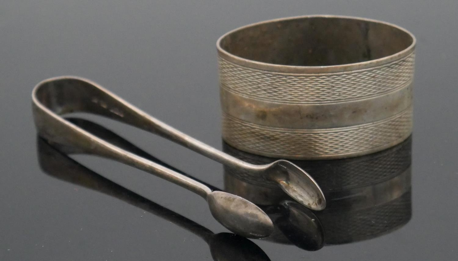 A collection of silver and silver plated teaspoons and other silver items. Including a pierced - Image 7 of 8