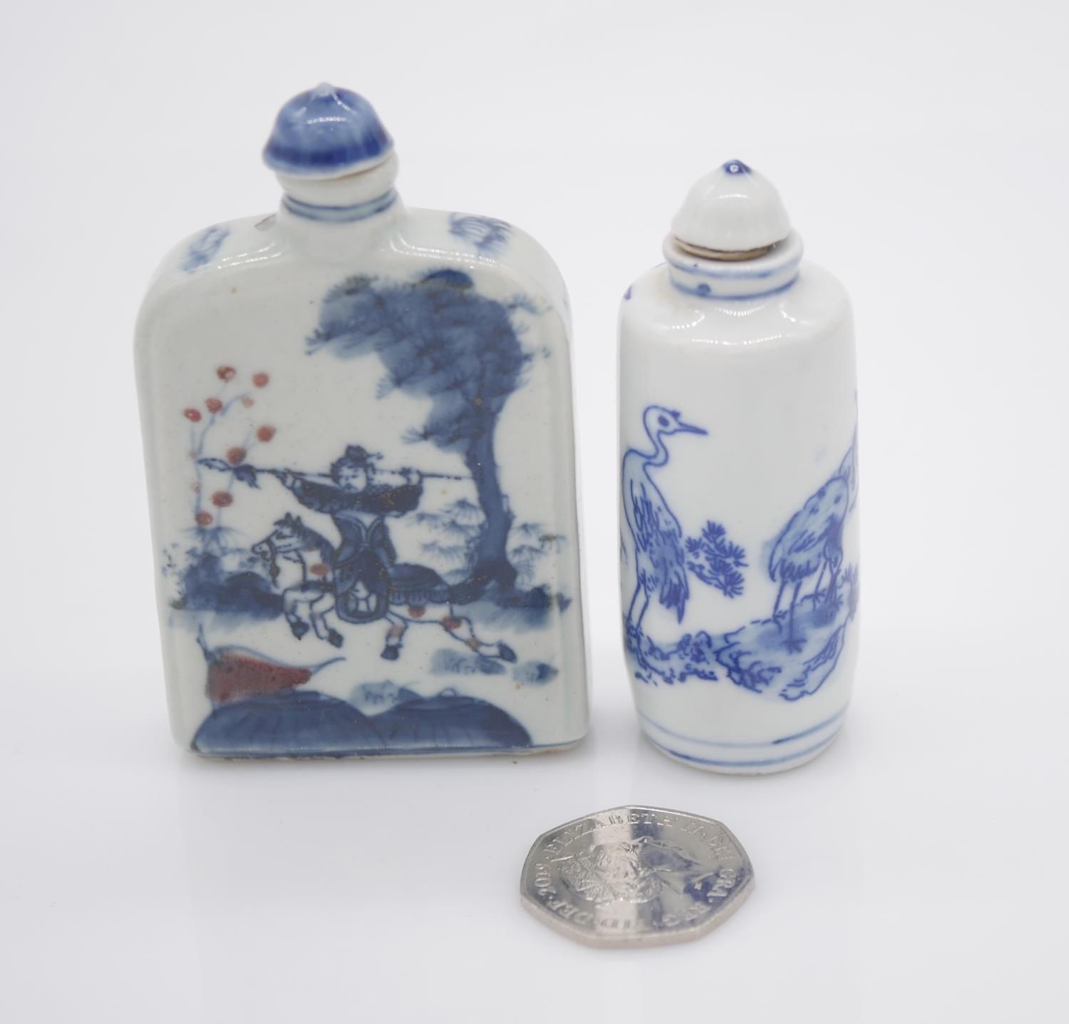 Two Chinese hand painted blue and white porcelain snuff bottles with blue glazed stoppers. One - Image 8 of 8