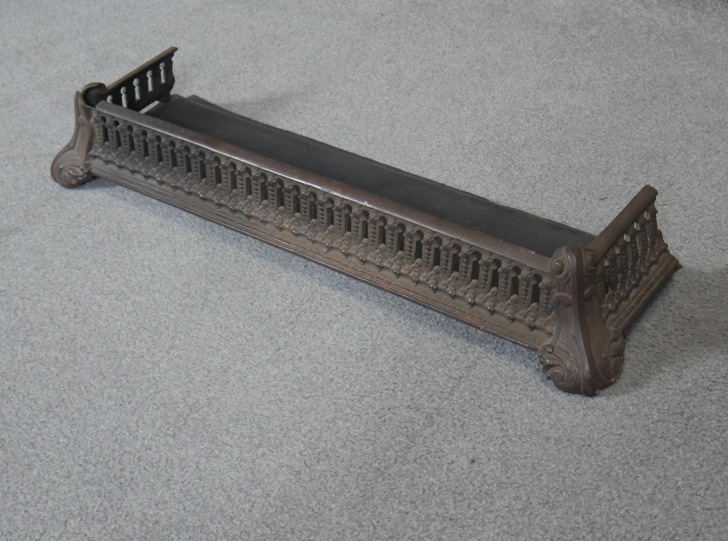 A 19th century cast iron fire kerb. L78cm - Image 2 of 3