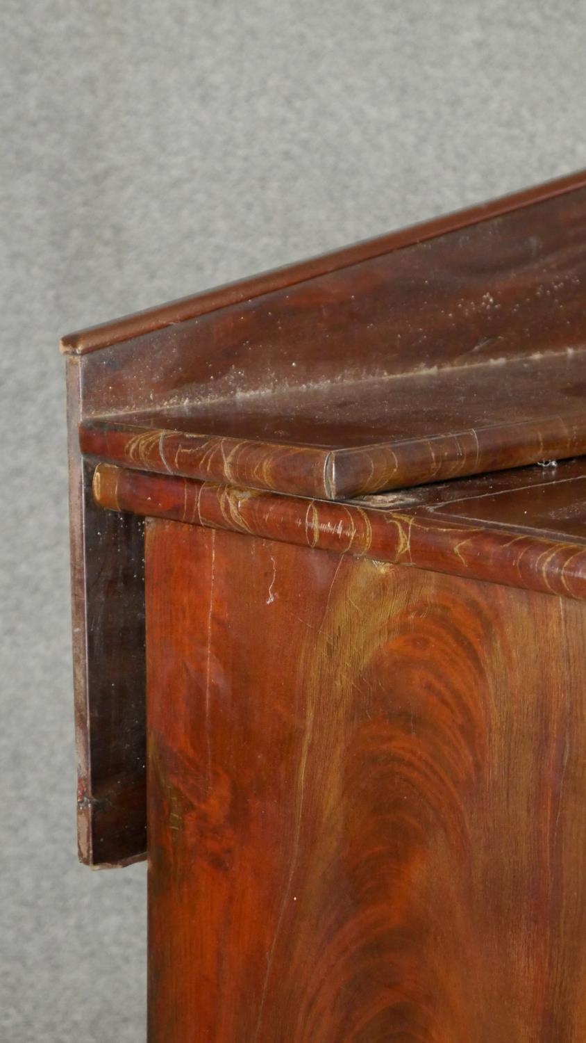 A mid 19th century flame mahogany chiffonier with raised back above frieze drawers and arched - Image 4 of 7