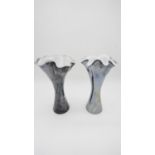 Two Art Glass trumpet vases with ruffled rims, grey and black coloured marbling to the clear glass