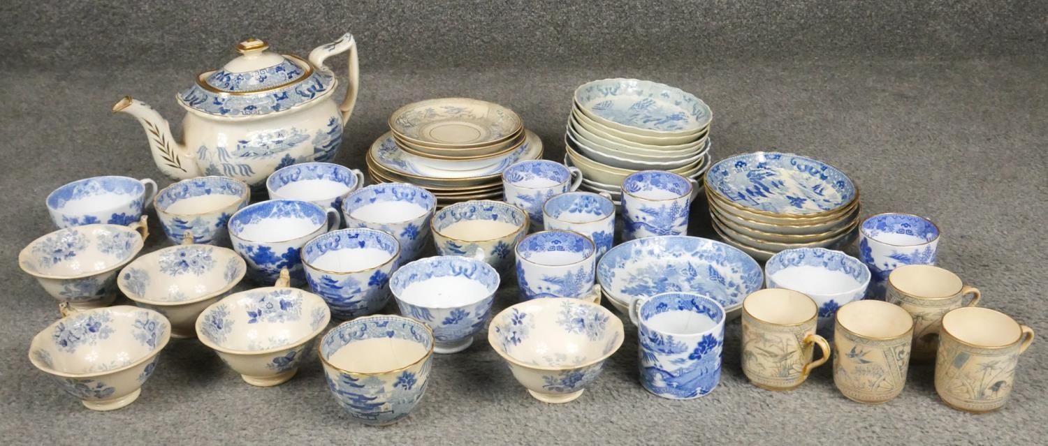 A large collection of early 20th century blue and white china with Oriental design and blue willow